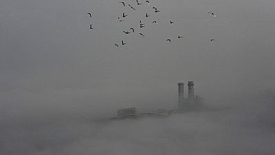 Thick pollution fog blankets Chinese skyline Thick pollution fog blankets Chinese skyline