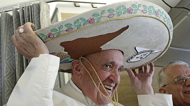 Patriarch using standard vestments to meet pope