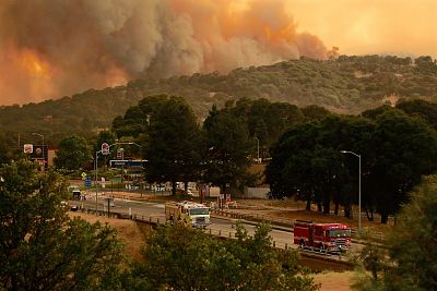 Smokes billows from the River Fire part of the Mendocino Complex of fires in Lakeport, California, on Sunday.