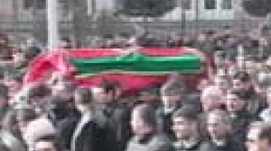 Slain Azeri journalist buried as tension mounts