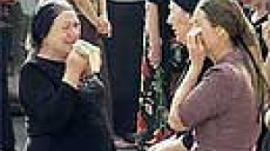 Poutine face à trois mères de victimes de la tragédie de Beslan