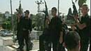 Police storm Gaza parliament over militants