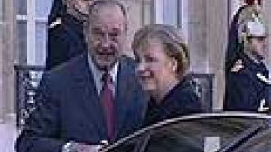 Merkel makes first foreign stop in Paris