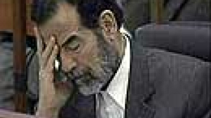 Angry scenes as Saddam threatens to boycott court hearing