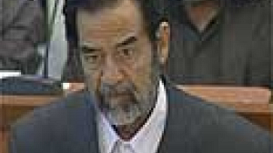 Saddam Hussein back in dock as trial resumes