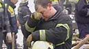 Vigil amid rescue at Moscow roof collapse scene