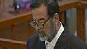Judge closes court to media as Saddam uses trial to incite violence