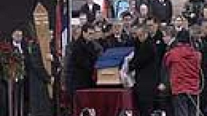 Supporters honour Milosevic at funeral