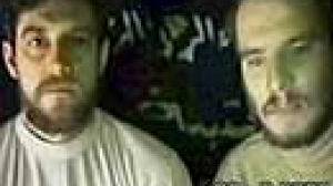 German hostages in Iraq make plea in new footage