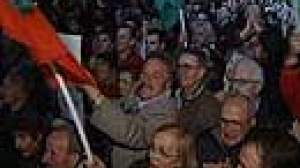 Prodi celebrates as Berlusconi cries foul