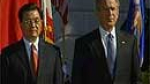 La visite du président chinois à la Maison Blanche perturbée par une adepte du Falung Gong.