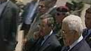 Olmert and Abbas break the ice in Jordan