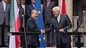 Iran told to stop enrichment before talks