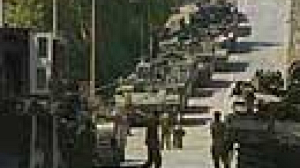 Israel masses ground forces on Lebanon border