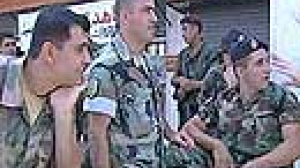 Lebanese troops have awkward role in south