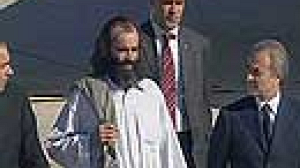 Italian freed by Afghan kidnappers arrives home