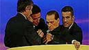 Berlusconi kept in hospital for heart checks