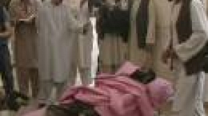 Afghan government shows off dead body of Taliban commander