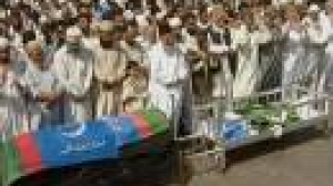 Pakistan buries its dead as Musharraf gives orders to fire on rioters