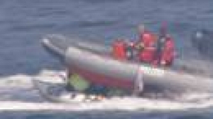 Anti-G8 protesters and police in boat chase