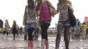 Muddy mayhem for Glastonbury revellers