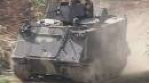 Lebanese troops battling militants advance into camp