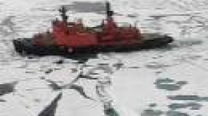 Russia plants flag on Arctic sea bed to push territorial claim