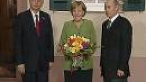 Putin shrugs off assassination warnings