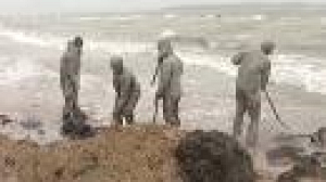 Russian soldiers sent to clean up slick