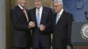 Bush, Olmert et Abbas main dans la main pour bâtir la paix au Proche-Orient