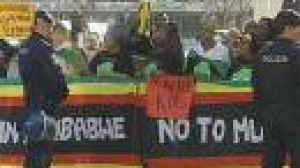 Two sides of the story: Mugabe’s critics and fans join protests