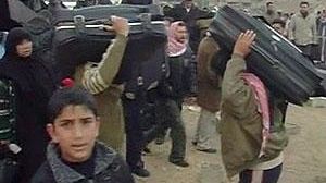 Palestinians pour into Egypt after gunmen blow up border wall