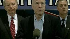 Rivals vow to battle on against Republican frontrunner McCain