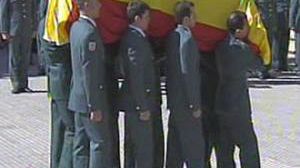 Spain buries officer killed in suspected ETA attack