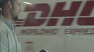 DHL cuts losses and does a deal with US rival