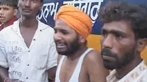 Inquiry launched after scores die in a stampede at an Indian temple