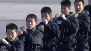 China defends security after deadly attack on police