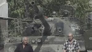 Russian troops remain in Georgia despite peace pact