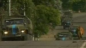 Georgians wait to see back of Russian tanks