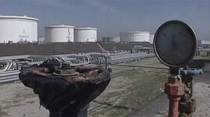 Oil prices up as dollar falls