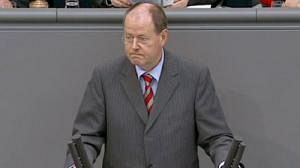 Germany blames US for global downturn