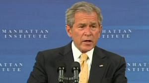 Bush defends free market system