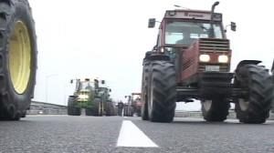 Protesting Greek farmers block roads