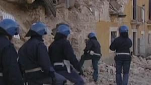 Police on hand as quake survivors retrieve property