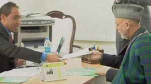 Karzai stands for re-election with controversial running mate