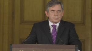Brown reshuffles cabinet as pressure grows