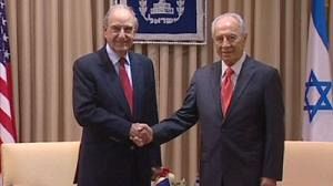 Israel’s Peres back to work after passing out
