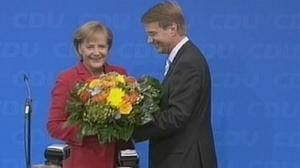 Merkel wins but CDU vote down