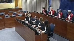 Victim families fume as start of Karadzic trial delayed