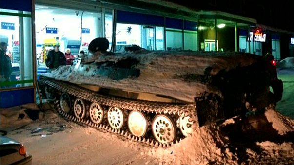 Russian man rams stolen armoured personnel carrier into shop, steals wine Russian man rams stolen armoured personnel carrier into shop, steals wine